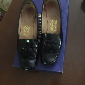 Patent leather loafers with tassels